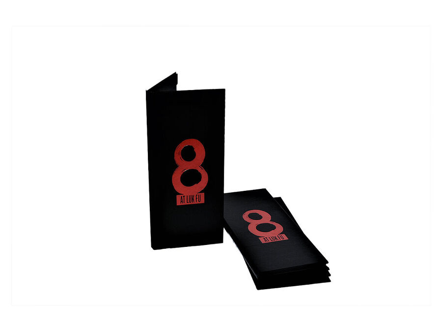 Black cover with gold foil stamped crest